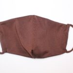 brown shimmery face mask